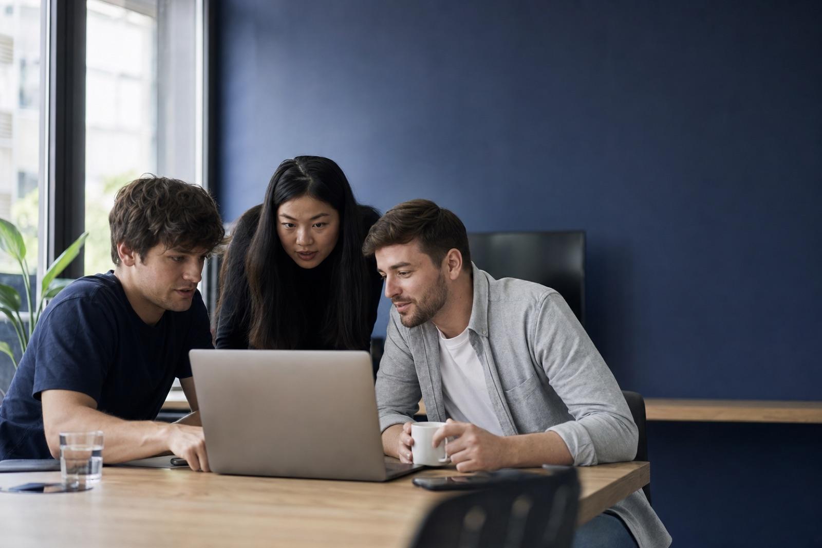 Professionals collaborating on enterprise technology work